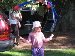 Hannah having a go with balls on a string!